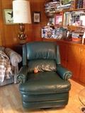 vintage lighting, vintage green leather reclining chair, books, CDs