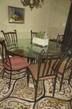 60" glass & iron table with 6 chairs