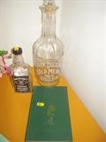 Jack Daniels  Gold metal bottle, book The legacy Of Jack daniels, Signed by the author Ben Green