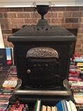 Glenwood wood burning heater #4                                    Home owner just decided to add this lovely wood burning heater that was never used to the sale. It is a #4 1898 Glenwood Parlor with Cherubs. 29 L x 24 W x 35 H . They purchased it in 1995 for $2450.00 and never connected to the house. your for $1000.00