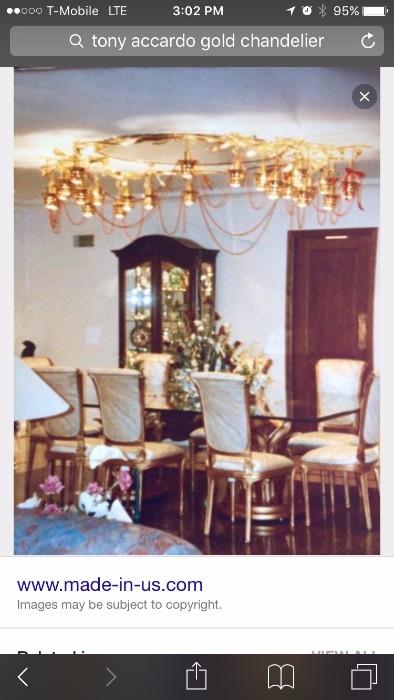 image from the Accardo Mansion on Google showing chandelier and the cabinet in this sale