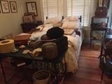 Queen size mattress and box springs, bed linens, crocheted work, baskets, oak two-tiered table, artwork