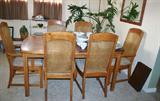 Table has leaves, covers, 6 chairs