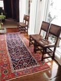 Persian Carpet and Set of 10 Italian Style Leather Chairs with Grommet Detail 