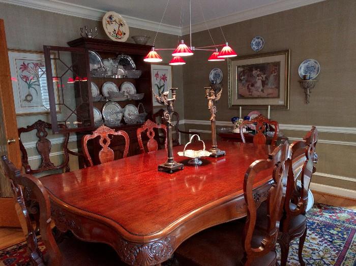Dining room, featuring Spanish hand carved mahogany table & 8 matching chairs.