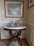 Victorian mahogany marble topped table, with great Aunt Mabel's silver plated tea service. 