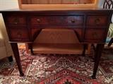 Antique English inlaid mahogany desk.
