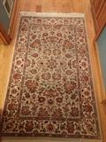 Nice little hand woven, 100% wool area rug, Persian Kashan design, measures 3' x 5'.