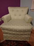 One of a pair of nicely upholstered armchairs. 
