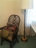 Windsor style chair; decorative pillows; floor lamp