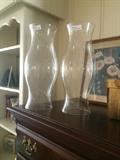 Two large clear hurricane globes