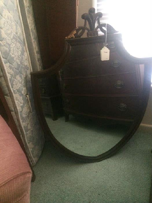 Shield-shaped mirror