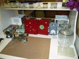 scotch tape, Steel small picture holders w/magnets, Glass jars, Ikea Desk (there are 2)