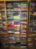100's of Hard bound and paperback books. There is Sci-fi, Mystery novels, Coffee table books, Innformational books. Also book cases