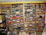 100's of Hard bound and paperback books. There is Sci-fi, Mystery novels, Coffee table books, Innformational books. Also book cases