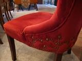 Matching Pair of red velvet Chairs with interesting design on back