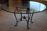 ROUND DINING ROOM TABLE, IRON BASE AND GLASS TOP