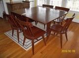 drop-leaf table and six chairs