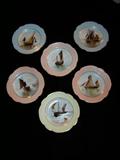 Set of 6 butter pats with hand painted ship scenes.