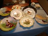 Assorted game and fish plates, hand painted.