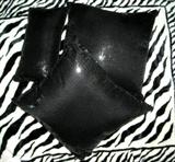 Variety of decorative pillows with sequins.