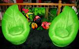 Set of 2 (left and right) mid century Hollywood Regency leaf chairs, apple green. R.F. Tapnio certified original painting in center.