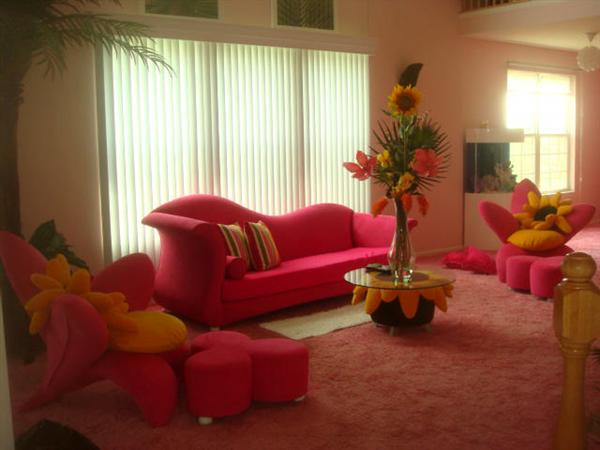Hollywood Regency modern: Ultrasuede hot pink couch. Bretz Bros. hot pink clover ottoman table. Hot pink Ultrasuede artist custom-made orchid chair.