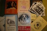 Dog trophies, figures, books, art and pictures, particularly of Saint Bernards.