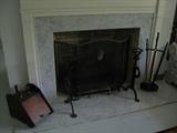 Fireplace accessories:  Very large andirons + a tool set & coal scuttle