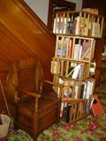 Hutch Table:  Chair has hinged seat for storage.  Table top slides down to create a table when needed.  Circa 1900 American Golden Oak period.  Stacked, revolving bookcase in newer but very functional.