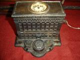 U. S. Fidelity & Guaranty Co., "We will bond you."  Unusual configuration of clock and inkwell.  Lid removed to reveal storage.