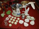 Royal Copenhagen 694 "Girl with Goats"; Kaiser Bisque Sculpture by Bochmann, "Geese in Flight"; Bing & Grondahl / B&G cat; many salt dips / salt cellars, some American Belleek; mirrored plateaus; ruby flash souvenirs; hand painted china.