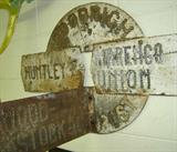 Goodrich Guidepost (Directional street sign):  Huntley 7 miles, Marengo 8 miles, Union 2 miles, Woodstock 10 miles.