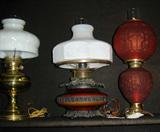 Many oil lamps.  Also many lamp parts, especially unusual glass globes.