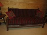 Stick sofa, red plaid cushions