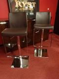 PAIR MODERN LEATHER AND CHROME HYDRAULIC ADJUSTABLE BARSTOOLS