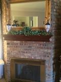 Gold framed mirror; antique matching urns