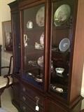 Four- shelf china cabinet with below storage