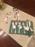 Assorted sterling spoons & knives
