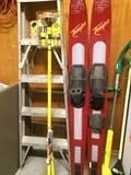 Skis; ladder; yard tools