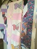 Several hand made quilts