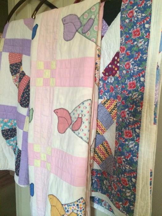 Several hand made quilts
