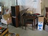 Large speakers, Queen Anne chair, Singer machine
