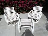 3 piece white patio set, 2 swivel rockers and table/foot stool