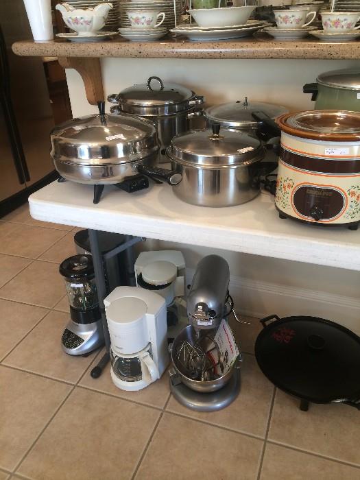 Many small appliances and pots & pans