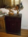 Mahogany finish piece is actually an early radio or TV cabinet (empty).