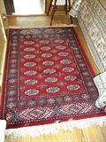 Hand woven 100% wool rug from Pakistan measures 5'5" x 3'5".