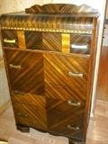 Waterfall front vintage dresser with wild woodgrain pattern!