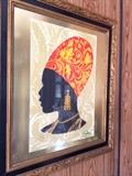 70s African art in gilt frame