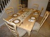 dining room table with additional leaves and custom pads with 6 chairs